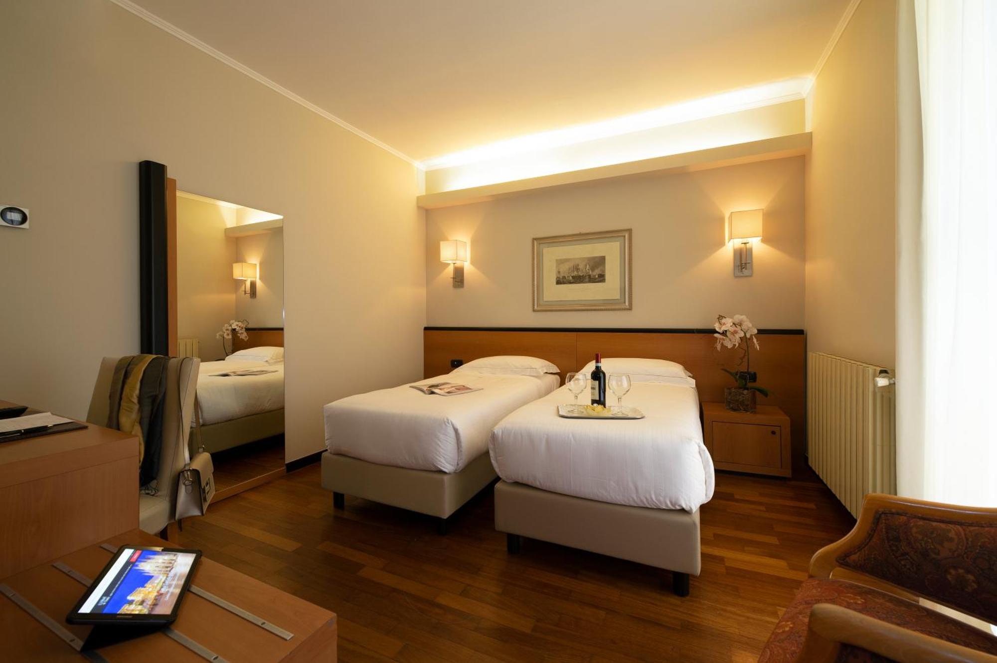 Hotel Fenice Milão Quarto foto
