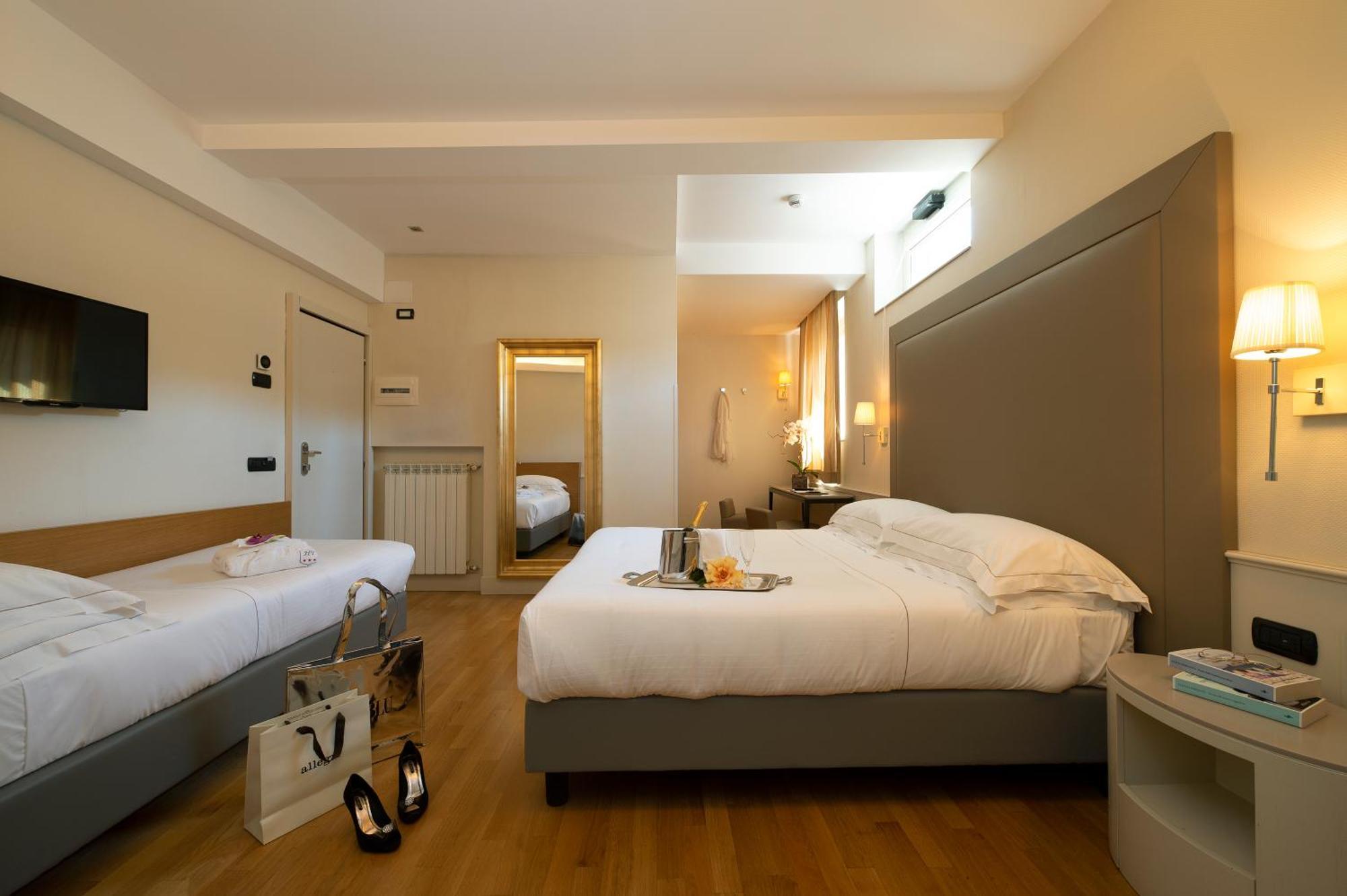 Hotel Fenice Milão Quarto foto